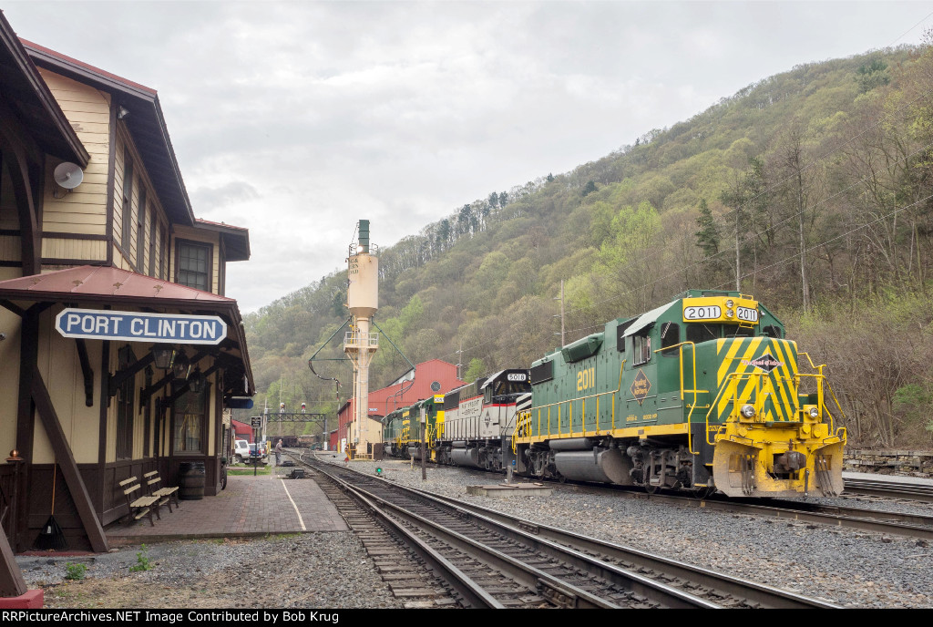 RBMN Freight Power adjacent to the main line track and station platform